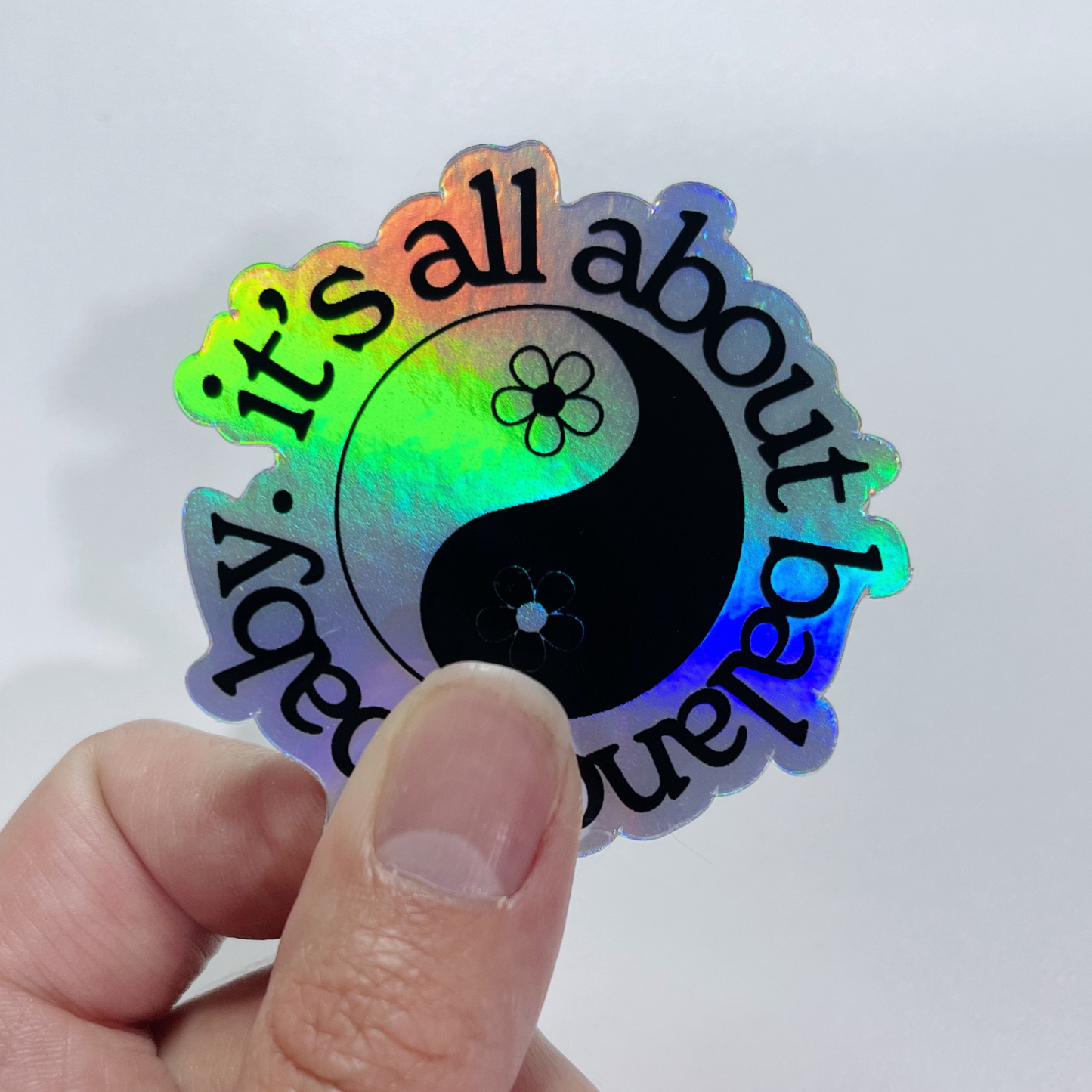 It's all about balance, baby Holographic Sticker