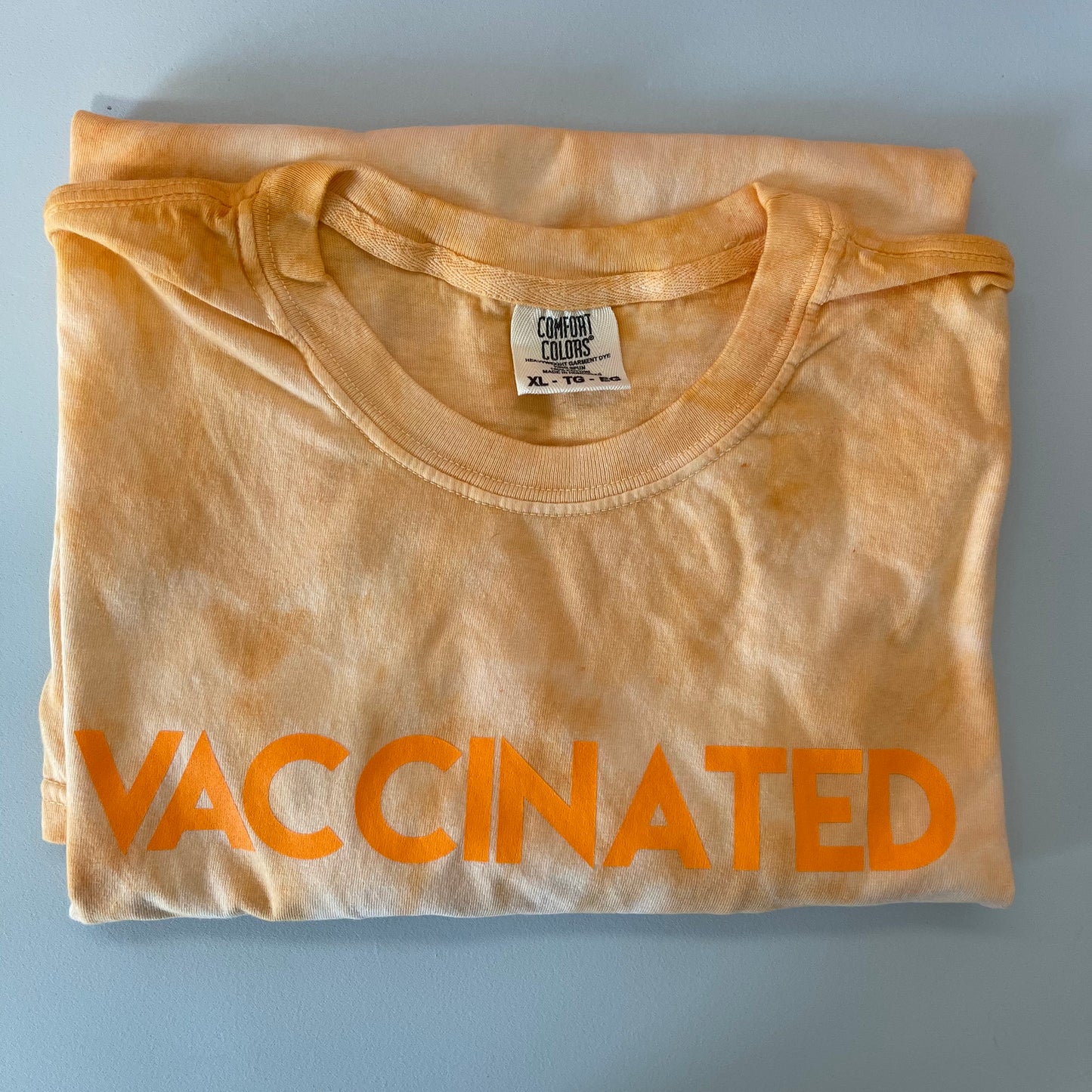 Orange Tie Dye VACCINATED Tee