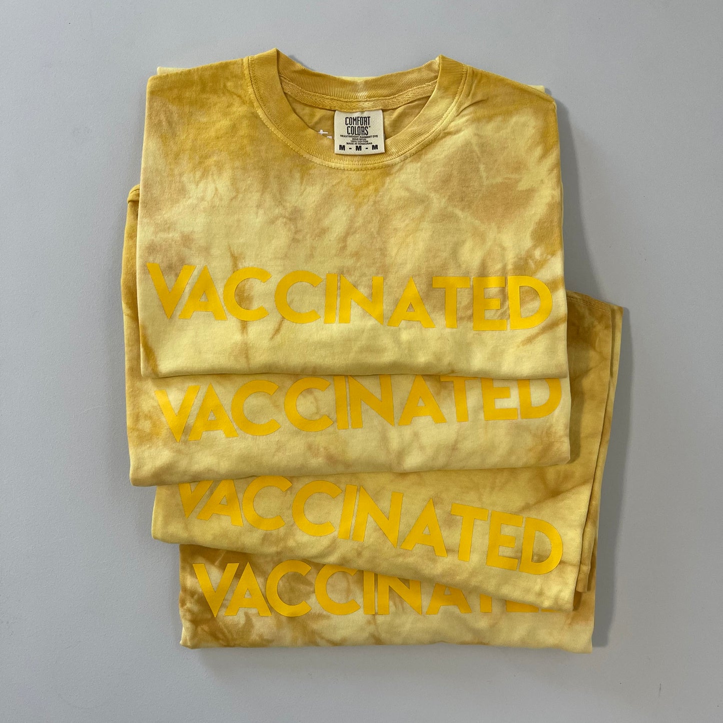 Golden Tie Dye VACCINATED Tee