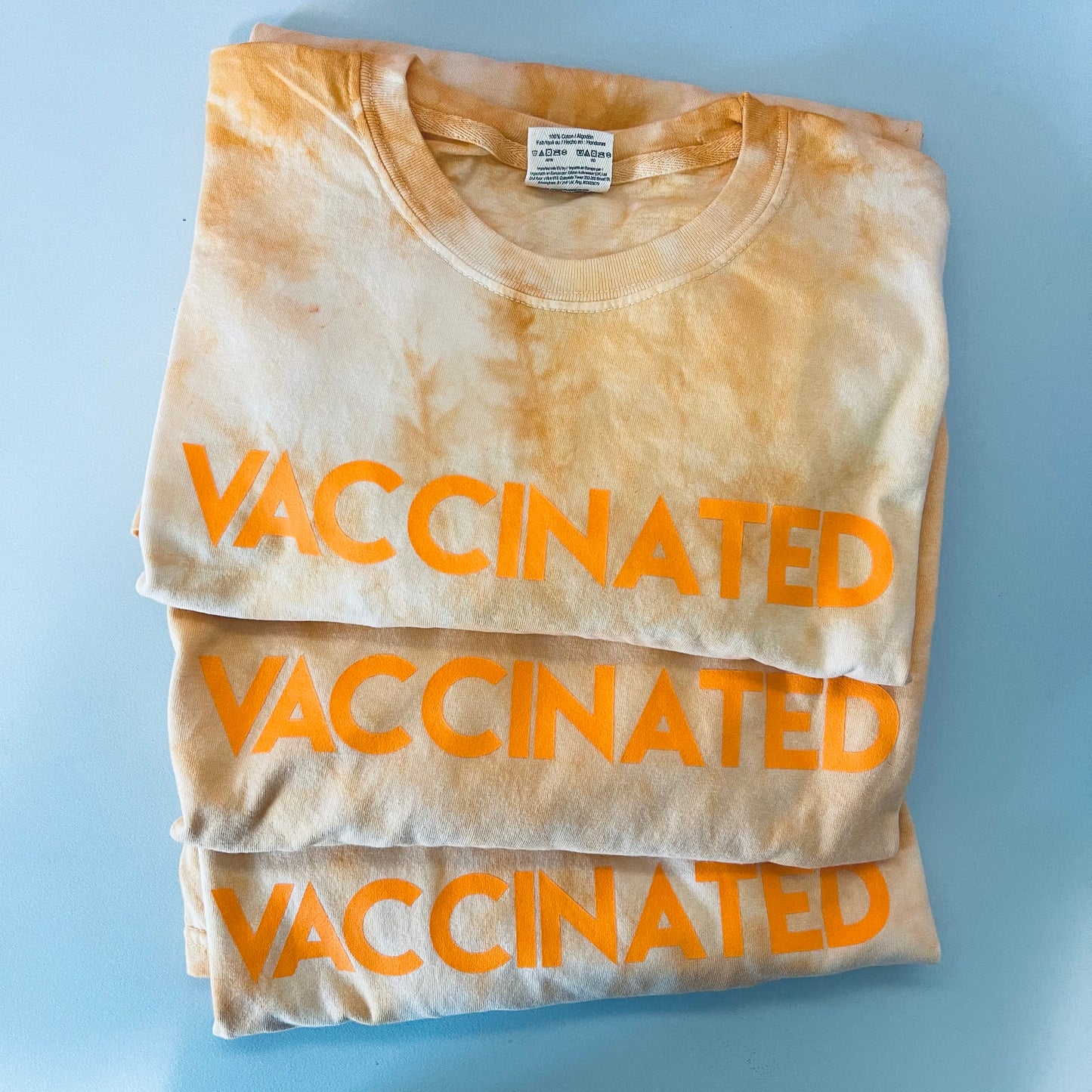 Orange Tie Dye VACCINATED Tee