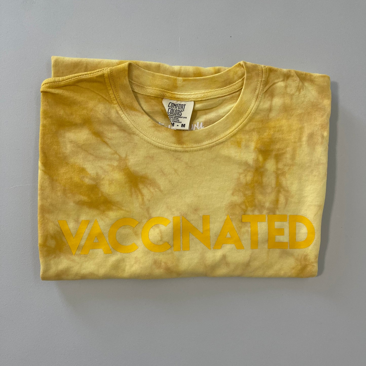 Golden Tie Dye VACCINATED Tee