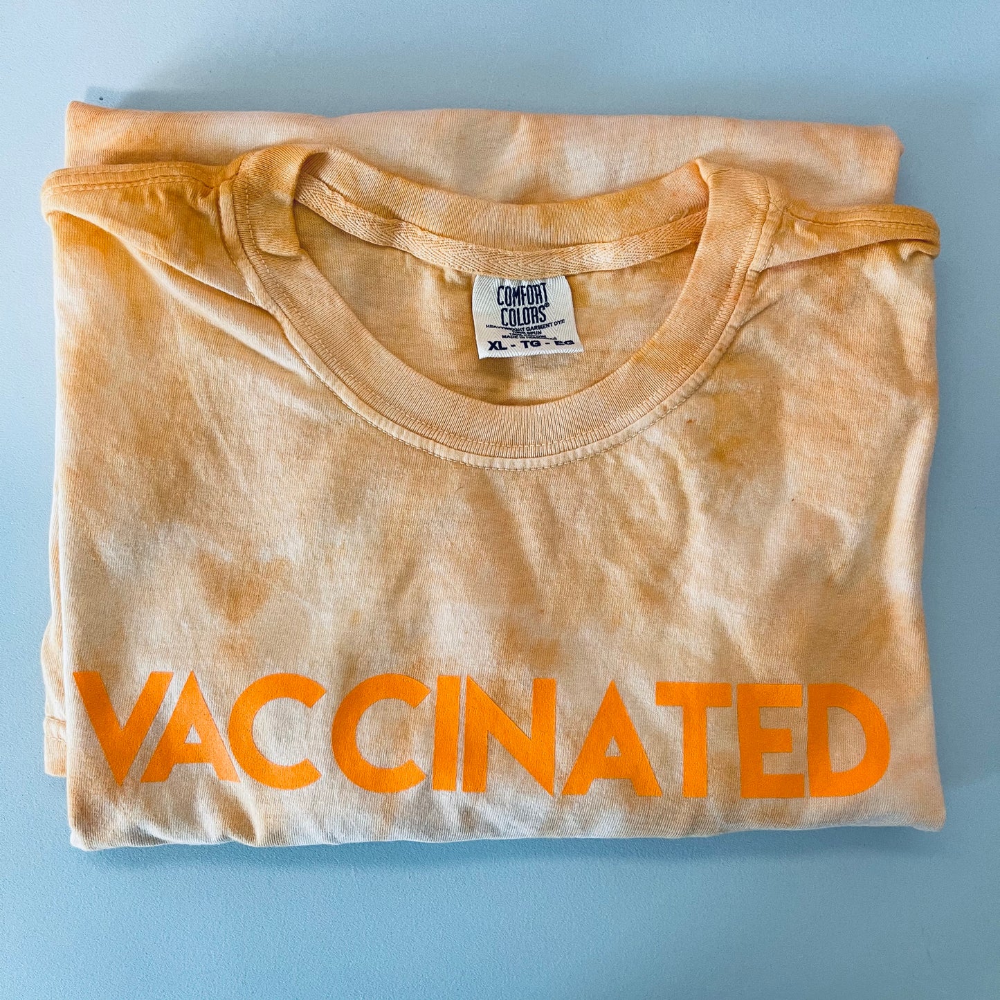 Orange Tie Dye VACCINATED Tee